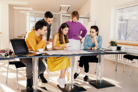 Young architects thinking over project