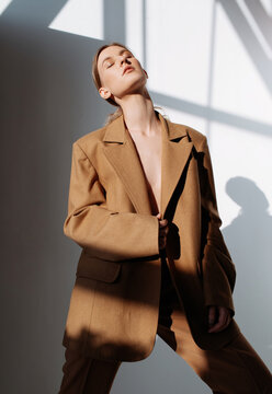 Sensual Woman In Trendy Brown Suit