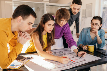 Young architects thinking over project