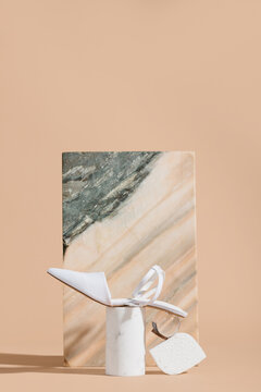 Stylish shoe against marble block