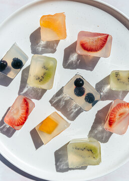 Japanese fruit jellies with fresh fruit on ceramic plate