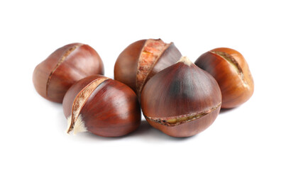 Delicious sweet roasted edible chestnuts isolated on white