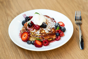 Stack of pancakes with berries