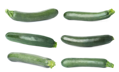 Set of whole fresh zucchinis on white background