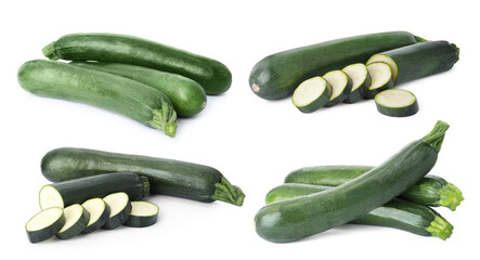 Set of fresh ripe zucchinis on white background