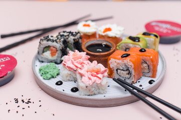 Sushi set on pink background