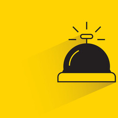 reception bell with drop shadow on yellow background