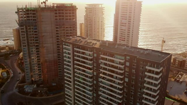 Aerial establishing shot, Chile Cocon, dolly out under a sunny sky