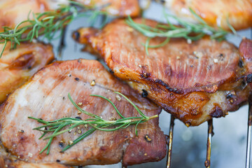 grilled pork meat with sauce and herbs and spices cooking thai asian food rosemary pork on chopping board /