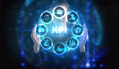Business, technology, internet and network concept. Young businessman thinks over the steps for successful growth: KPI
