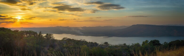 Fototapeta na wymiar Panorama Beautiful sunset over lake at Lam Ta Khong Reservoir, Nakhon Ratchasima province, Thailand.