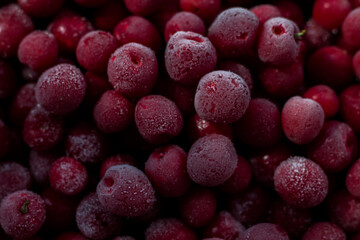 Background from frozen cherries. Ripe berry. Background from fruits.