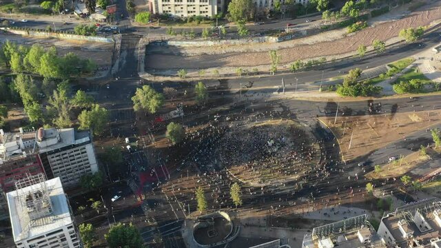 SANTIAGO, CHILE - OCTOBER 25, 2020 thousands of protesters begin to arrive at Plaza Baquedano in the center of Santiago de Chile hours after the end of the plebiscite