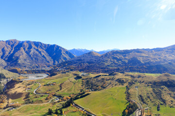 The blue sky and beautiful mountain view from helicopter sightseeing in Queenstown, New Zealand.