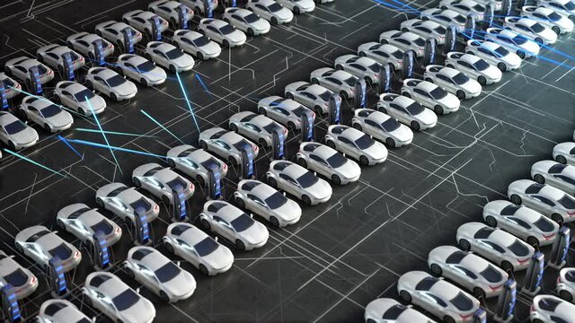 Parking lot with electric charging stations for electric vehicles. Aerial view of new electric self driving cars on car on a huge car dealership parking lot.