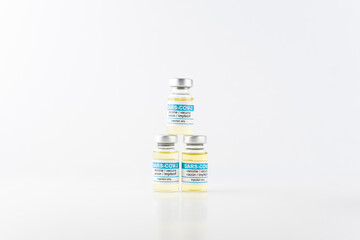 three vaccines on white background