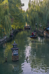 Obraz premium The sunrise view of the architectures and rivers in Zhouzhuang, a ancient Chinese village in Jiangsu, China.