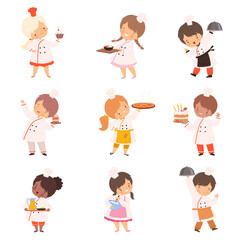 Cute Little Chefs Characters in Uniform Cooking in the Kitchen Set, Boys and Girls with Kitchenware Utensils and Freshly Prepared Dishes Cartoon Style Vector Illustration