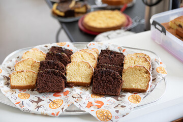 on cake plate are light and dark cake pieces