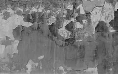 black and white image, old wall surface with peeling paint, plaster crack