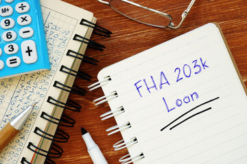 Financial concept meaning FHA 203k Loan with inscription on the sheet.