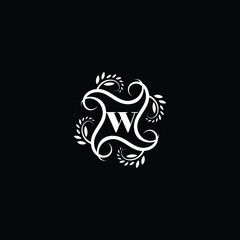 Initial Letter W Flourish circle monogram logo.