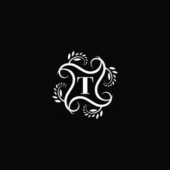 Initial Letter T Flourish circle monogram logo.