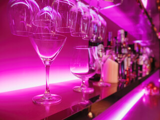 Cocktail Glass on Bar shelf drink Party nightclub blur background