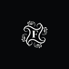 Initial Letter F Flourish circle monogram logo.