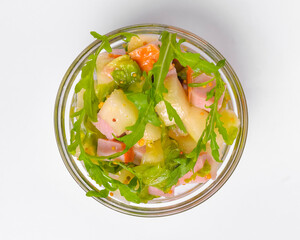 Healthy food - mix vegetable salad served in a bowl over white background. Healthy eating, delicious snack or dinner.