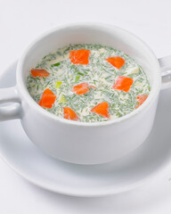 Cold soup okroshka. Traditional Ukrainian or Russian cuisine. Delicious sour cream or mayonnaise soup for summer.