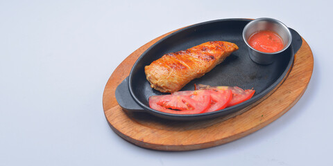 Juicy grilled barbecue steak served over white background. Delicious bbq meat concept