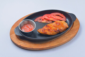 Juicy grilled barbecue steak served over white background. Delicious bbq meat concept