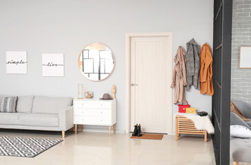 Stylish interior of modern hall in studio apartment