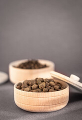 a dried aromatic allspice pepper fruit, West Indian condiment, culinary spice, copy space