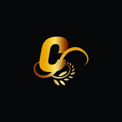 Fototapeta premium Initial Monogram Letter C Flourishes Logo in gold color.