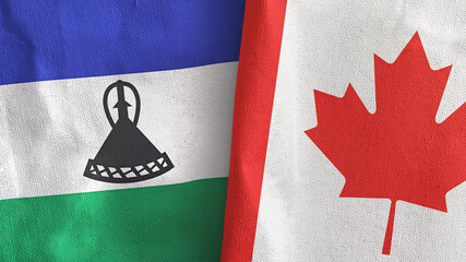 Canada and Lesotho two flags textile cloth 3D rendering