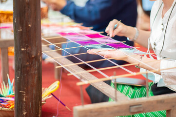 Northern thailand woman weaving machine hand made