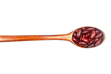 Red kidney beans on wooden spoon isolated on white background.
