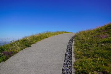pedestrian path go up in the mountains horizon