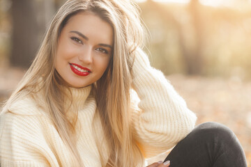 Naklejka premium Classic woman portrait on autumn background