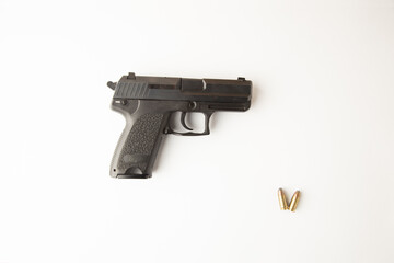 Black pistol on white background