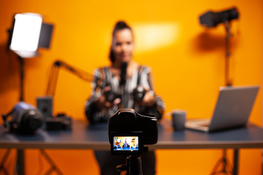 Professional camera recording vlog of famous blogger. New media star influencer on social media talking video photo equipment for online internet web show.
