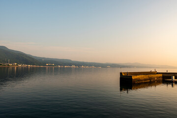 長崎県雲仙市　小浜町冨津漁港から望む小浜温泉街