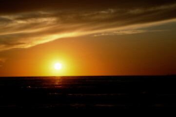 Fototapeta na wymiar Beautiful sunset over the sea during summertime