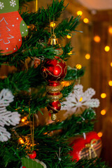 Christmas decor in red and green color scheme with yellow lights: Christmas tree