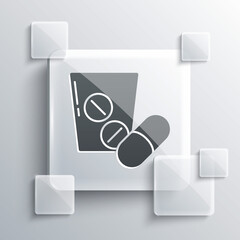 Grey Medicine pill or tablet icon isolated on grey background. Capsule pill and drug sign. Pharmacy design. Square glass panels. Vector.