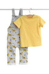 Baby-boy (girl) pants and yellow t-shirt hanging on shoulders  isolated on white background for spring and autumn wardrobe/ Baby clothes