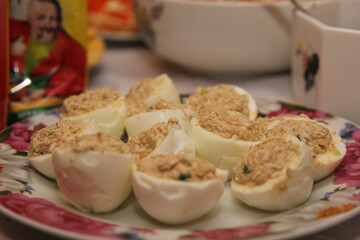 eggs stuffed with salad cod liver on the table