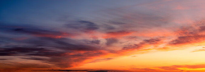 Backgrounds and textures. Beautiful and dramatic colorful sky with clouds at sunset. Sky texture. Abstract nature background.